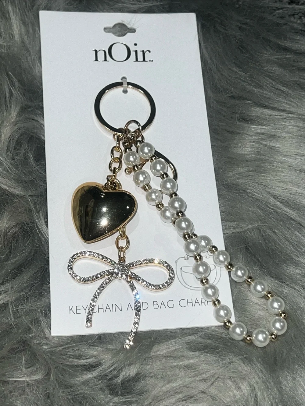 nOir Jewelry add touch